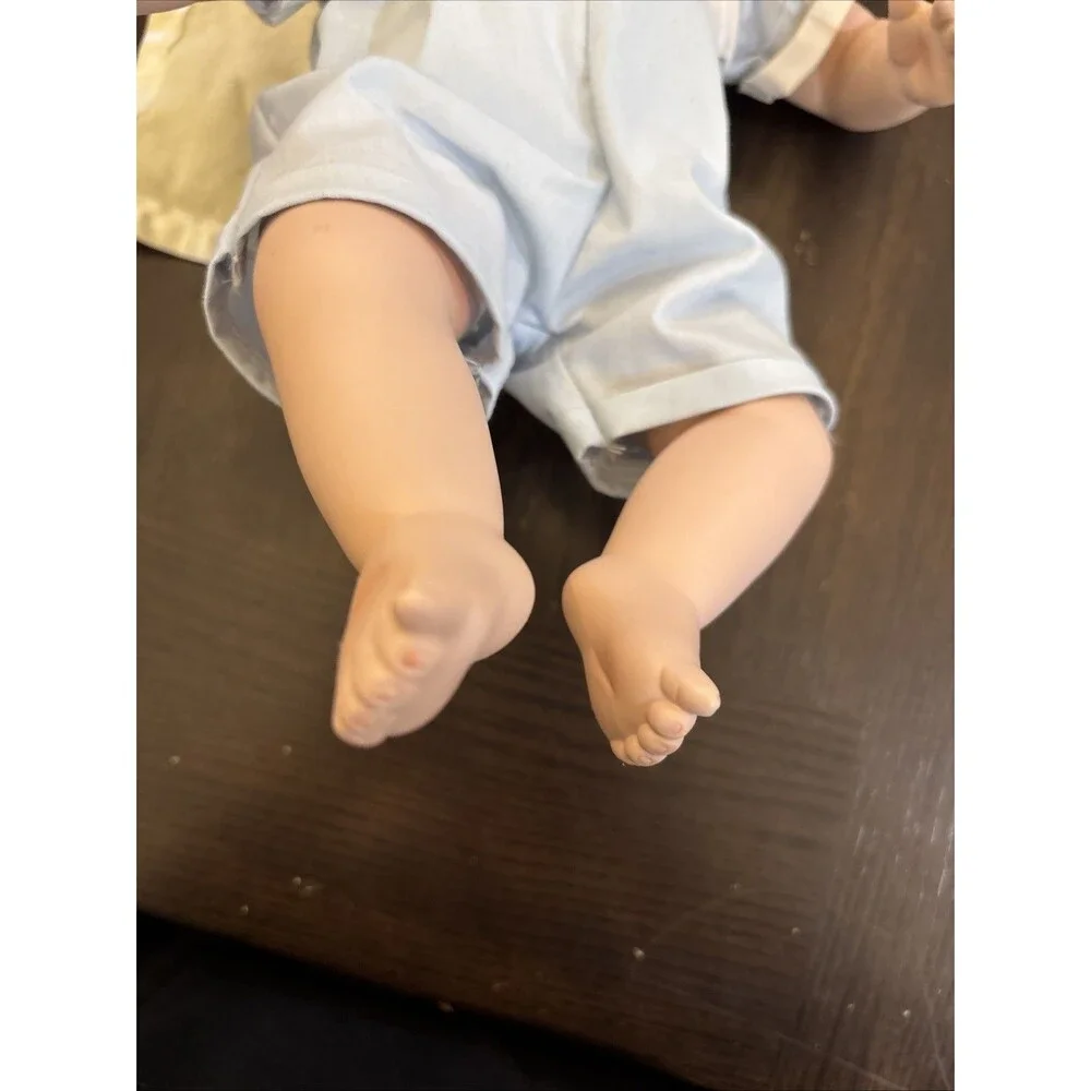 Ashton Drake tickles porcelain